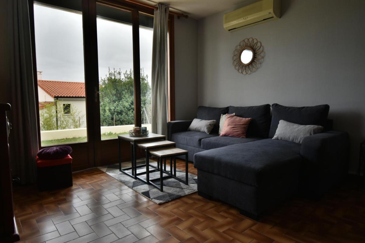 Appartement avec jolie vue et jardin privatif