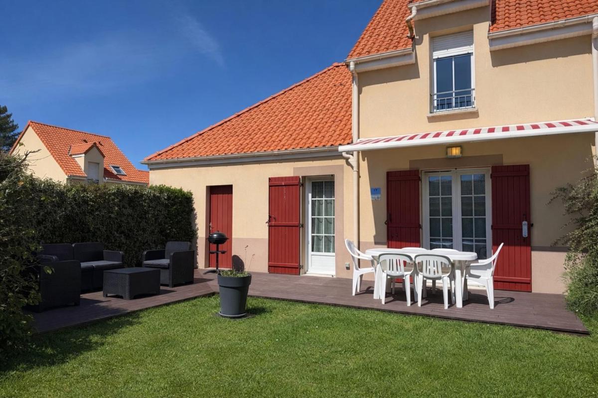 Maison avec jardin dans résidence fermée