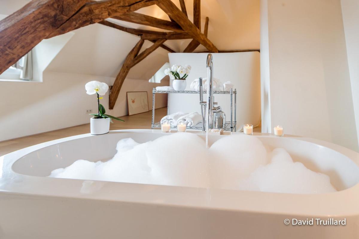 Suite Mana OHANA - Luxe et Authenticité juste à coté de la Place Ducale avec Parking privé
